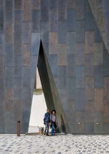 Students crossing through the entrance of the portal.