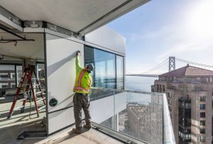 Another construction photo showing the facade installation.