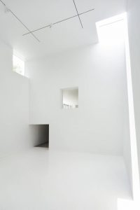 Another photo of Gallery 2—the isotropic room— showing the entrance and a window from within the building.