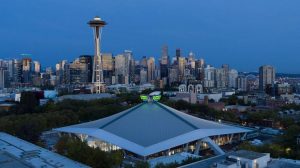 Climate Pledge Arena against Seattle backdrop.