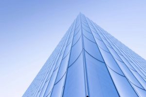 A closeup of the glass facade at the building’s corner.