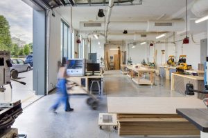 The interior opens in this fabrication lab to the outside to showcase acts of ‘making’ to passersby.