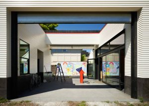 This courtyard serves as a versatile outdoor space for art installations, movie nights, and gallery access.