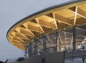 The timber canopy structure of the center from the outside