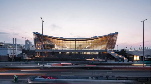 well lit exterior shot of aquatics centre