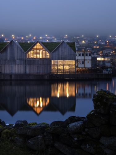 wooden house with a roof