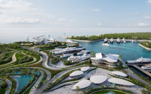 aerial view of a yacht oasis destination surrounded by water and greenery