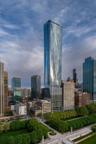 rendering of a skyscraper in a city