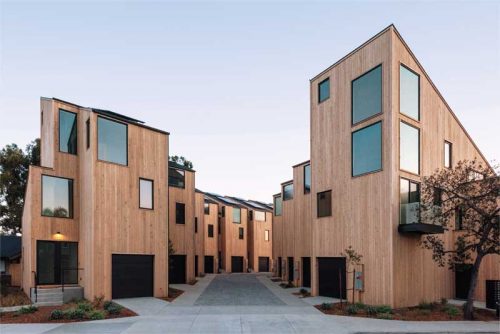 row house with cedar tongue-and-groove sliding