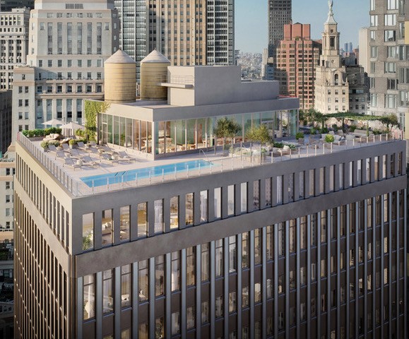 Rooftop view of a modern high-rise building featuring a luxurious pool, outdoor lounge area, greenery, and a glass-enclosed space, set against a city skyline with historic and contemporary architecture.